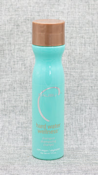 Malibu C Hard Water Wellness Shampoo. The perfect defense against dull, dry, discolored, damaged locks caused by Magnesium and Calcium minerals in your water, this 100% vegan super shampoo boasts top-notch cleansing capabilities without harsh chemicals or sulfates