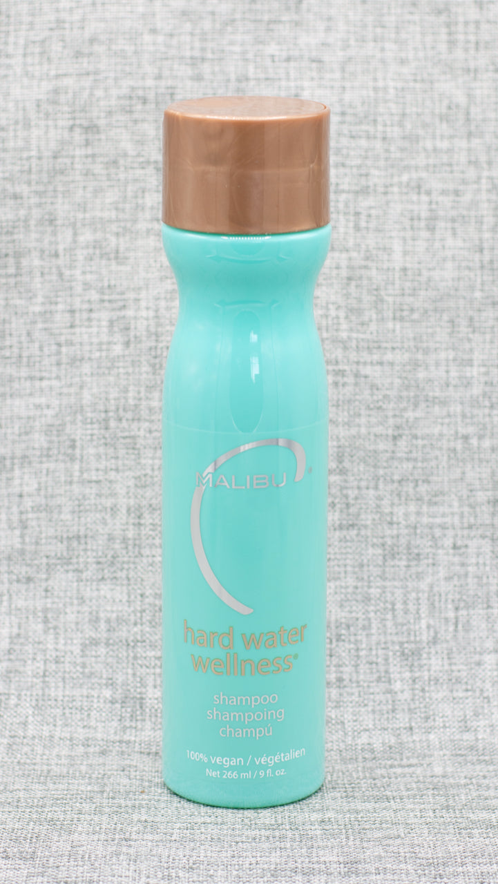 Malibu C Hard Water Wellness Shampoo. The perfect defense against dull, dry, discolored, damaged locks caused by Magnesium and Calcium minerals in your water, this 100% vegan super shampoo boasts top-notch cleansing capabilities without harsh chemicals or sulfates