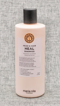Maria Nila Head & Hair Heal Shampoo-FOR SENSITIVE AND DRY SCALP. A soothing and strengthening shampoo with calming aloe vera extract.
The active ingredients in Head & Hair Heal Shampoo helps balance your hair and scalp for a healthy look and feel.
The shampoo has a flowery scent of jasmine and linden blossom. 
Dry scalp relief.