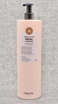 Maria Nila Head & Hair Heal Shampoo-FOR SENSITIVE AND DRY SCALP. A soothing and strengthening shampoo with calming aloe vera extract.
The active ingredients in Head & Hair Heal Shampoo helps balance your hair and scalp for a healthy look and feel.
The shampoo has a flowery scent of jasmine and linden blossom. 
Dry scalp relief.