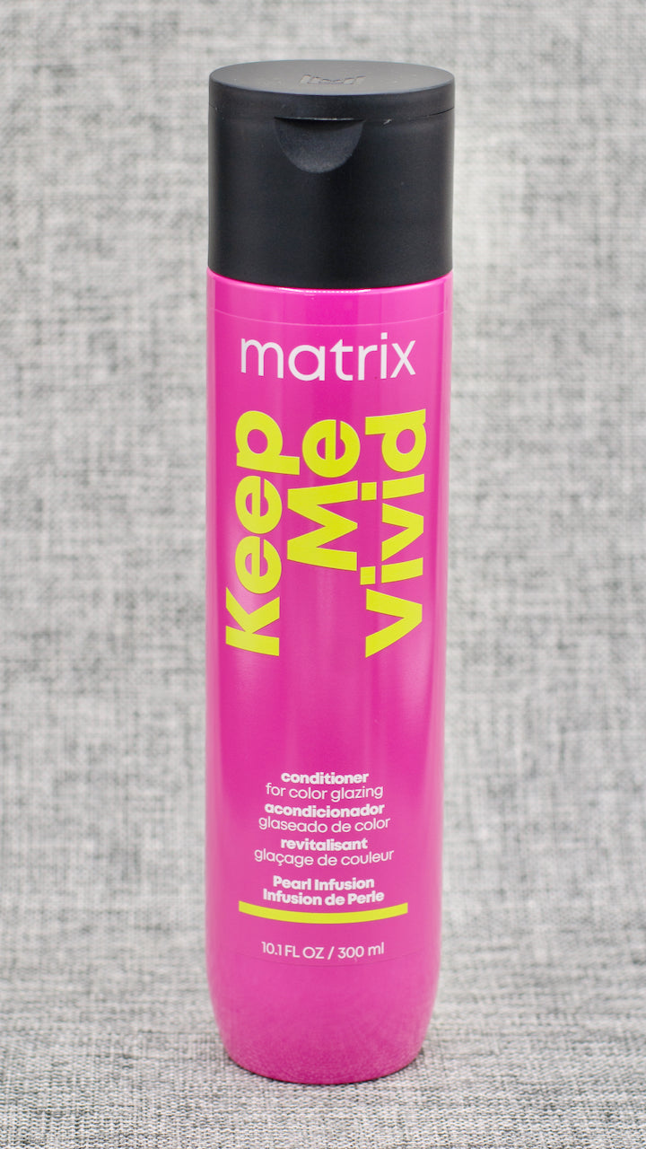 Matrix Keep Me Vivid Conditioner. Acidic conditioner deeply nourishes color-treated hair.  Deeply nourishes each strand without the weight. Glazing conditioner. Helps keep hair color sealed.