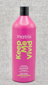 Matrix Keep Me Vivid Conditioner. Acidic conditioner deeply nourishes color-treated hair.  Deeply nourishes each strand without the weight. Glazing conditioner. Helps keep hair color sealed.