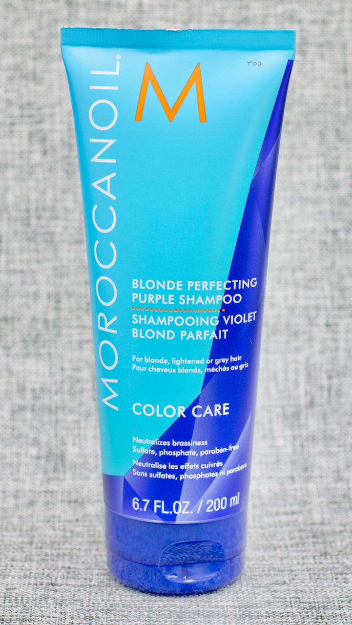 Moroccan Oil Blonde Perfecting Purple Shampoo. A pro-strength, sulfate-free purple shampoo to gently cleanse while neutralizing brassiness and helping to restore brighter, more radiant color. Fight brassiness in blonde, lightened brunette, and grey hair with this sulfate-free purple shampoo.