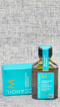 Moroccan Oil Original Treatment Oil. argan oil-infused hair oil used to smooth frizz, detangle, condition, and boost shine. Named the #1 haircare oil. silky, shiny and healthy hair you've always wanted. Moroccanoil Treatment argan oil. The original foundation for hairstyling, Moroccanoil Treatment can be used as a conditioning, styling and finishing tool. Infused with antioxidant-rich argan oil.
