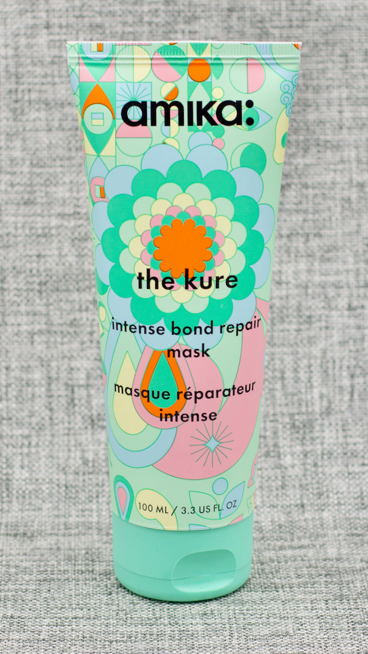 Amika The Kure Intense Bond Repair Mask, a rich, ultra-moisturizing hair mask that reduces breakage + prevents future damage. a rich, ultra-moisturizing, repair hair mask that's clinically proven after one use to significantly reduce breakage + prevent future damage. 