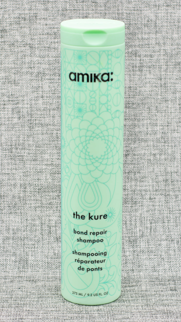 Amika The Kure Bond Repair Shampoo For Damaged Hair is a gentle shampoo that repairs damage + prevents future breakage for your strongest mane yet. a bond repair shampoo that luxuriously lathers and is clinically proven to repair + strengthen damaged strands due to everyday stressors, heat + chemical treatments.