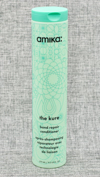 Amika The Kure Bond Hair Repair Conditioner, a conditioner that repairs damage + prevents future breakage for your strongest mane yet. a bond repair conditioner that's ultra moisturizing and clinically proven to repair + strengthen damaged strands due to everyday stressors, heat, + chemical treatments.