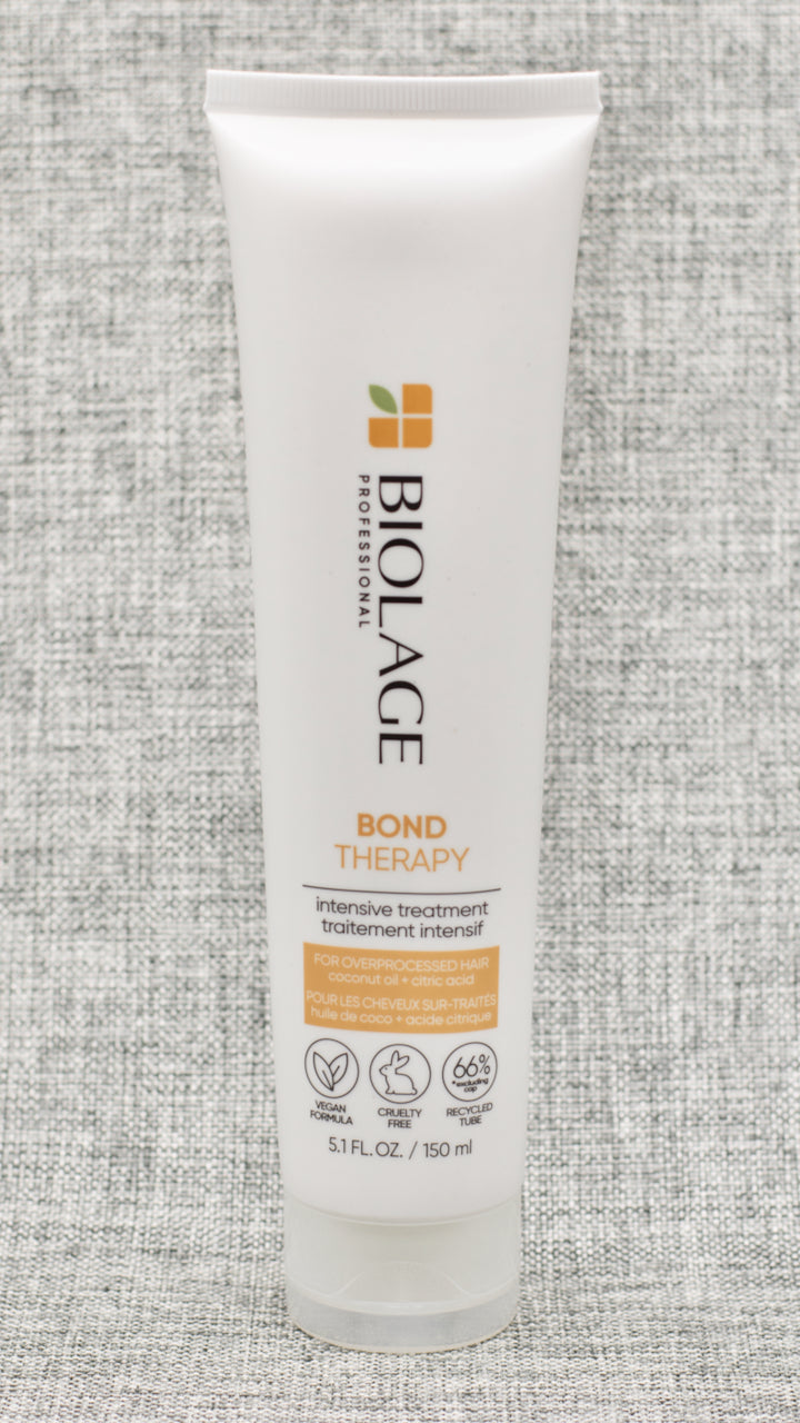 Biolage Bond Therapy Intensive Treatment is a creamy pre-shampoo mask for overprocessed, damaged hair. Infused with coconut oil and repairing agent citric acid, this treatment deeply conditions and builds bonds from the inside out, restoring hair strength.