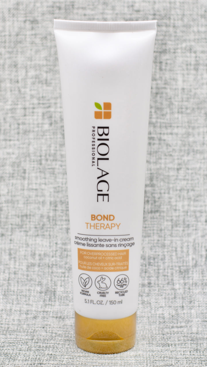 Biolage Bond Therapy Smoothing Leave-In Cream is infused with coconut oil and repairing agent citric acid to intensely condition and build bonds from the inside out. smoother hair, tames frizz, adds shine, and provides heat protection up to 450°F.