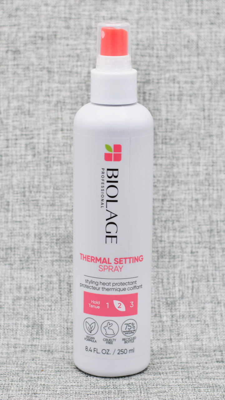 Biolage Styling Thermal Setting Spray strengthens and conditions hair while guarding against heat styling. Blue agave nectar hydrates and treats hair for healthy, natural volume and shine.