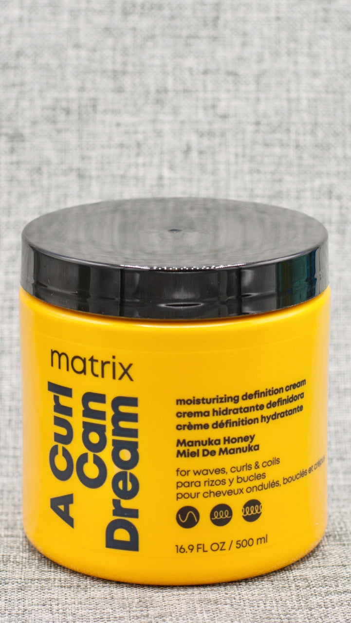 A Curl Can Dream Moisturizing Cream for curls; coils is a leave-in cream that provides moisture and definition, without flaking or crunch! Infused with Manuka honey extract, which acts as a natural humectant and adds moisture to hair, it is free of silicones, sulfates, parabens, mineral oil, petrolatum and paraffins. 