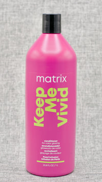 Matrix Keep Me Vivid Conditioner. Acidic conditioner deeply nourishes color-treated hair.  Deeply nourishes each strand without the weight. Glazing conditioner. Helps keep hair color sealed. 