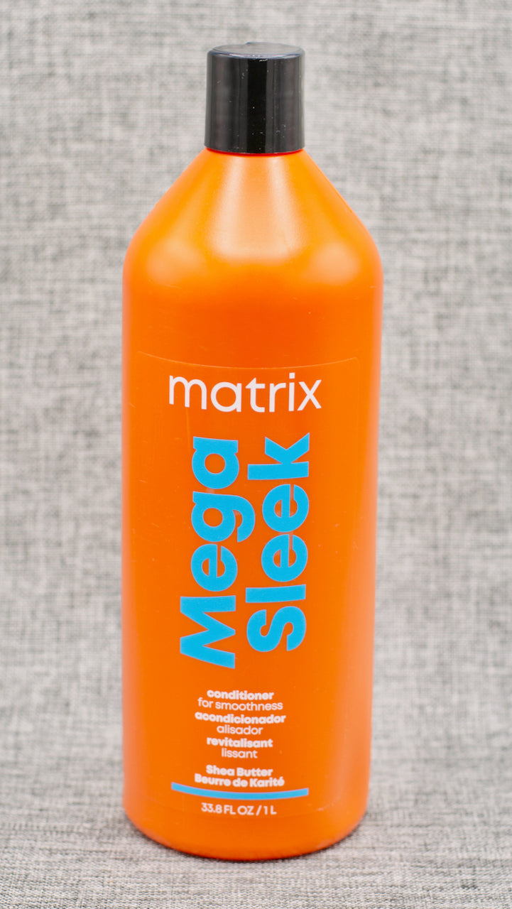 Matrix Mega Sleek Conditioner. Conditions to help control rebellious, unruly hair and manages frizz against humidity. The search for smooth, sleek hair is over thanks to Mega Sleek System. This anti-frizz, vegan-formulated conditioner with shea butter helps control rebellious, unruly hair and manages frizz against humidity for smoothness, leaving hair smooth, shiny and defrizzed, with up to 5x smoother hair.