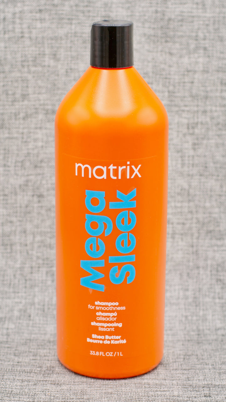 Matrix Mega Sleek Shampoo Cleanses to help control rebellious, unruly hair and manages frizz against humidity. Mega Sleek Shampoo with smoothing shea butter helps control rebellious, unruly hair and manages frizz against humidity for smoothness. Hair is smooth, shiny and de-frizzed.