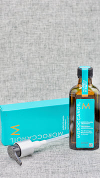 Moroccan Oil Original Treatment Oil. argan oil-infused hair oil used to smooth frizz, detangle, condition, and boost shine. Named the #1 haircare oil. silky, shiny and healthy hair you've always wanted. Moroccanoil Treatment argan oil. The original foundation for hairstyling, Moroccanoil Treatment can be used as a conditioning, styling and finishing tool. Infused with antioxidant-rich argan oil. 