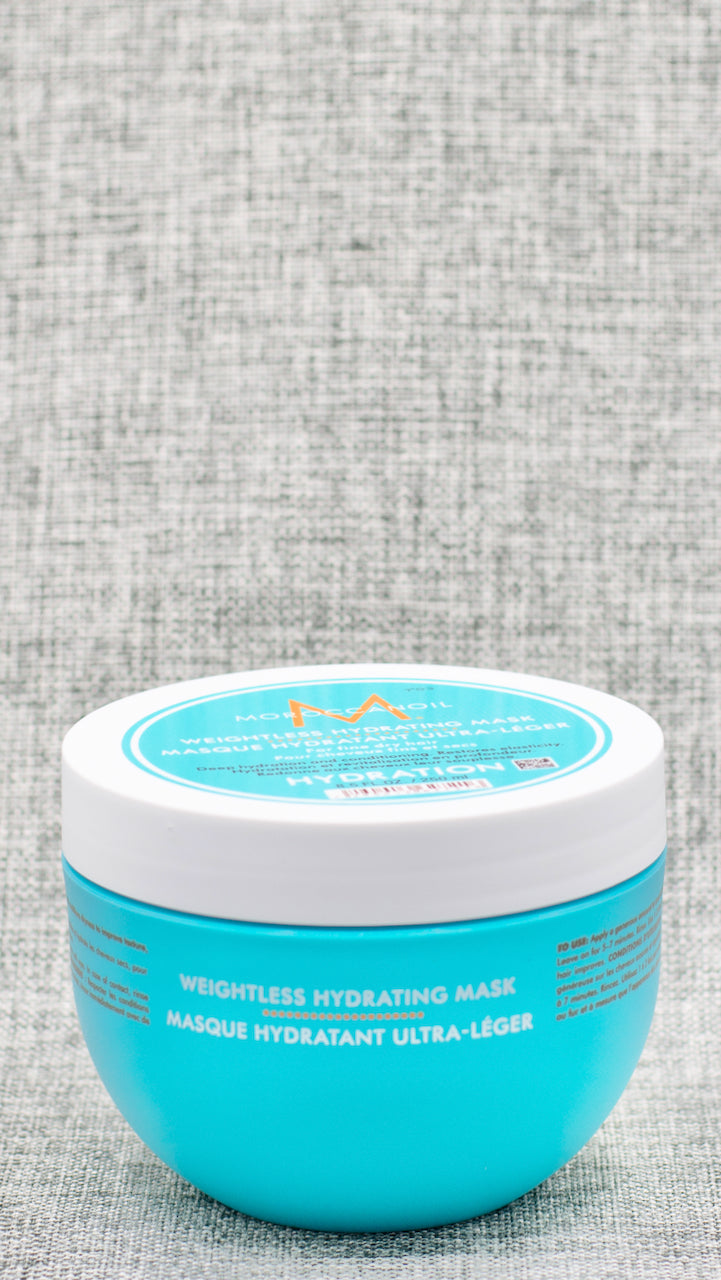 Moroccan Oil Weightless Hydrating Mask revives lifeless, dry hair with this moisturizing, five-minute hair mask. is a rich and creamy, yet lightweight, deep-conditioning treatment that's rich in argan oil and nourishing ingredients. This high-performance formula hydrates and conditions fine hair while dramatically improving its texture, elasticity, shine and manageability.