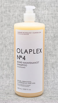 Olaplex Nº.4 Bond Maintenance Shampoo. A highly-nourishing and reparative shampoo. N°4 Shampoo repairs and protects hair from everyday stresses including damaged hair, split ends, and frizz by re-linking broken bonds. Leaves hair easier to manage, shinier and healthier with each use.