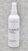 Olaplex Volumizing Blow Dry Mist, infused with patented OLAPLEX Bond Building Technology, is a reparative blow-dry mist that provides lasting body and bounce and also protects hair from heat, leaving it visibly soft, shiny, and healthy.