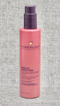 Pureology Smooth Perfection Smoothing Lotion. A Lightweight lotion that controls frizz and flyaways while protecting against heat styling. Smooths and nourishes hair. Protects against heat styling up to 450°F. Up to 72 hours of frizz control