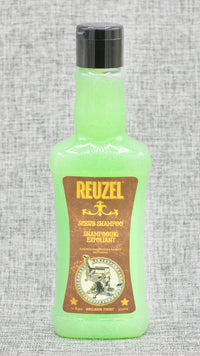 Reuzel Scrub Shampoo Exfoliant is a Perfect for maintaining a healthy scalp. This invigorating and exfoliating formula is perfect for the heavy product user and infrequent shampooer to remove excess product and buildup from hair. 